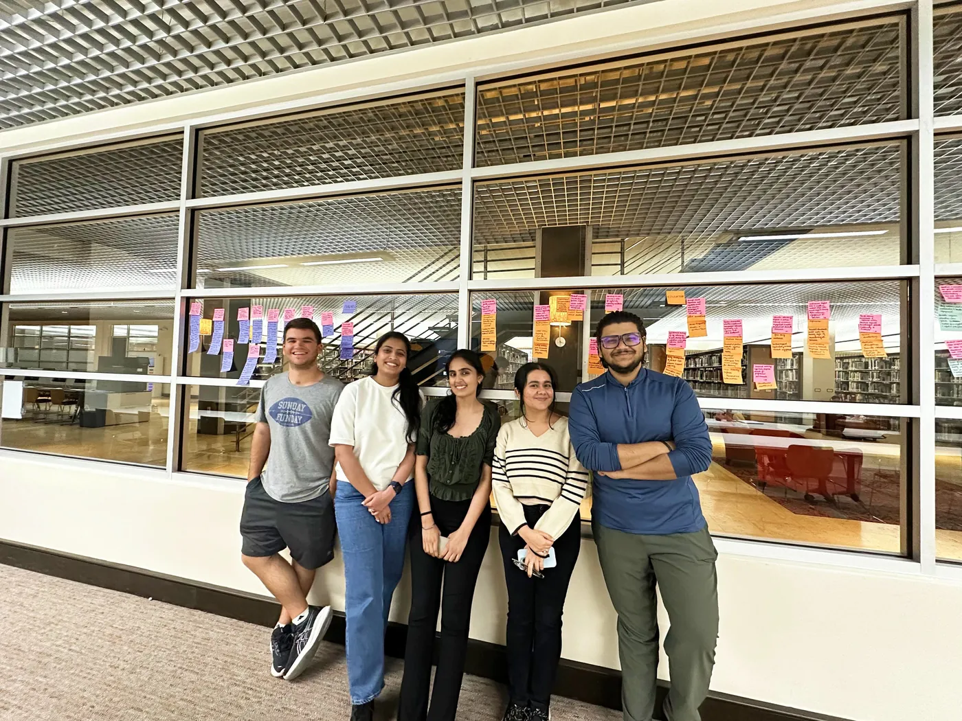 Team Comet, five students, standing together in the SCAD studio